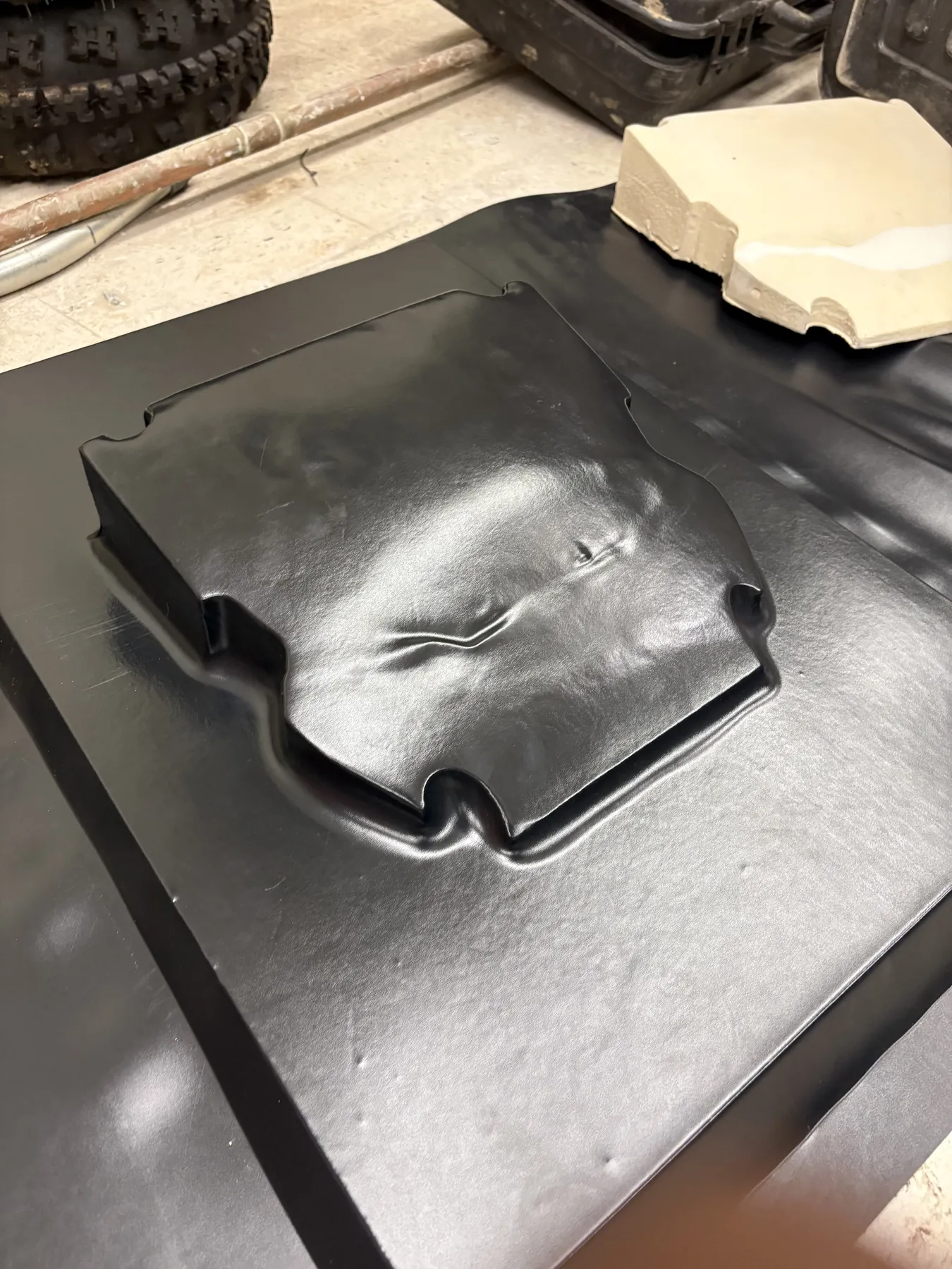 A Kydex sheet after forming, before trimming.